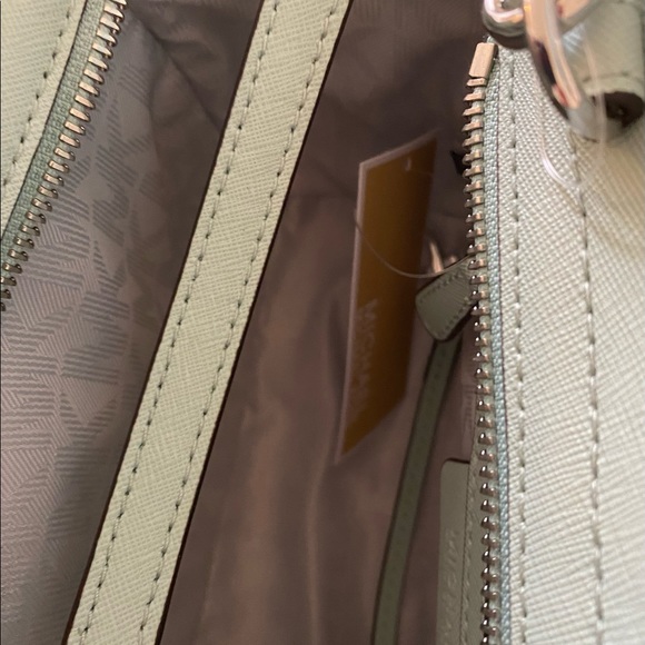 Michael Kors ready for spring sea foam in color purse with shoulder strap. - Picture 3 of 7